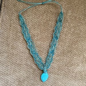Macramé necklace with faux turquoise bead.